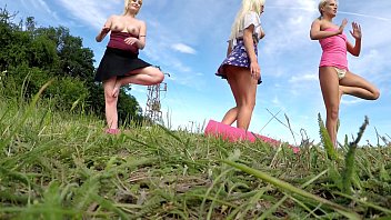 outdoors public fitness in shortest skirts on a windy day outside with many upskirts and asses exhibitions