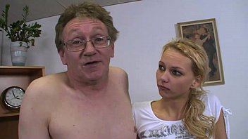 cute blondie fucked on the office desk by mature man